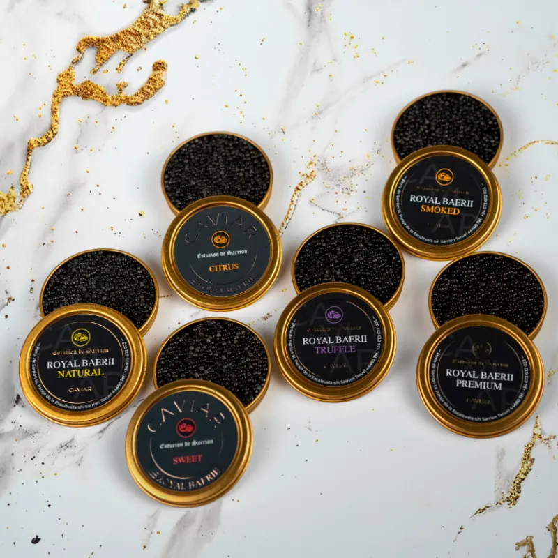 Latas de caviar Negin Gourmet numeradas sobre mármol